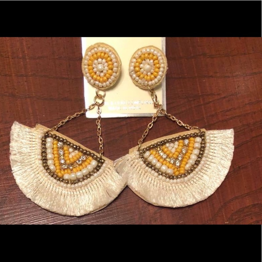 Dangle white and orange earrings